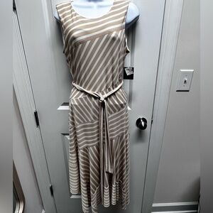Gabby Skye Tan/ivory sleeveless flattering asymmetrical dress. NWT SIZE 10